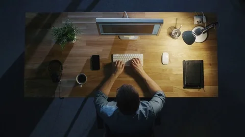 Top View of a Programmer Writing Code on His Personal Computer at Night.  Stock Footage 71466895
