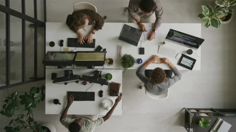 Top View of Programmers Working in Open Space Office Stock Footage 255784049
