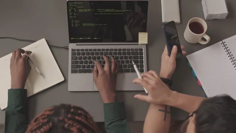 Top View of Programmers Working with Program Codes on Laptop Video stock 195979955