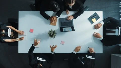Top view of project manager give vr head set to businesspeople. Directorate. Stock Photos