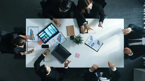 Top view of project manager give vr head set to businesspeople. Directorate. Stock Photos