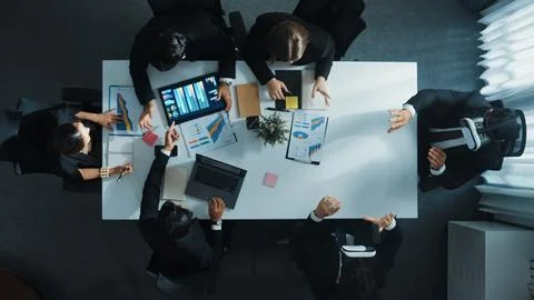 Top view of project manager give vr head set to businesspeople. Directorate. Stock Photos