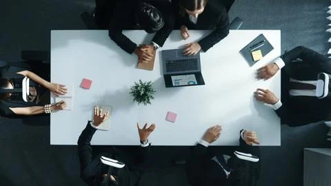 Top view of project manager give vr head set to businesspeople. Directorate. Stock Photos