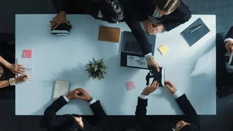 Top view of project manager give vr head set to businesspeople. Directorate. Stock Photos