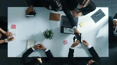 Top view of project manager give vr head set to businesspeople. Directorate. Stock Photos