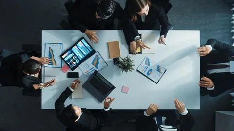 Top view of project manager give vr head set to businesspeople. Directorate. Stock Photos