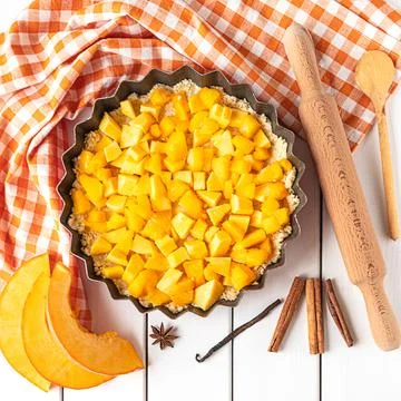 Top view of a pumpkin pie baking process Stock Photos