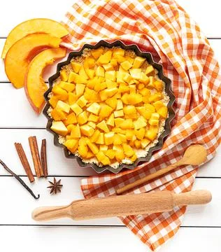 Top view of a pumpkin pie baking process Stock Photos
