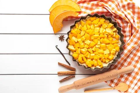 Top view of a pumpkin pie baking process Stock Photos