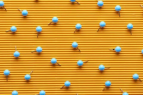 Top view push pins textured Stock Photos