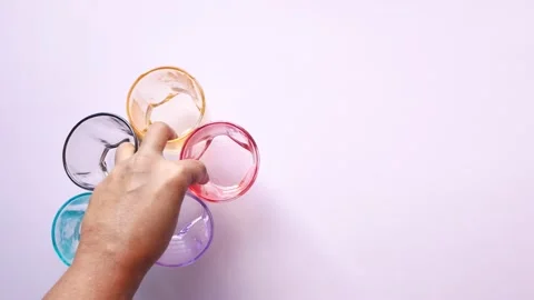 Top view of putting many empty drinking glass on table Stock Footage 203963103