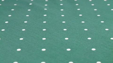 Top view of the queen blue with white polka dots cotton fabric rotated  Stock-Footage 293881362