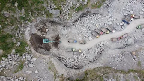 Top view of the queue of sand trucks in Kali Adem Stock Photos
