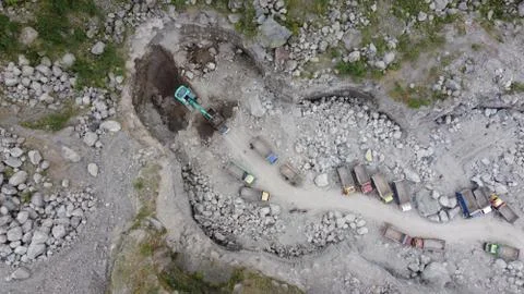 Top view of the queue of sand trucks in Kali Adem Stock Photos