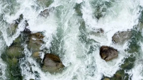 Top view of a quick current: background showing white foam in a mountain river Stock Footage 160323452
