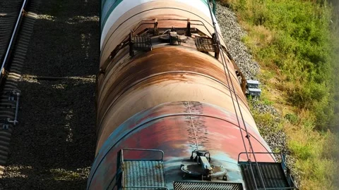 Top view of the railway tracks along which the freight train is moving. Video stock 339765651