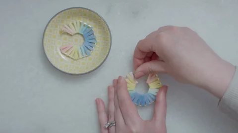 Top View Of Rainbow Colored Hoop Earrings, Woman Unclasps Backing To Put It on Stock-Footage 128217465