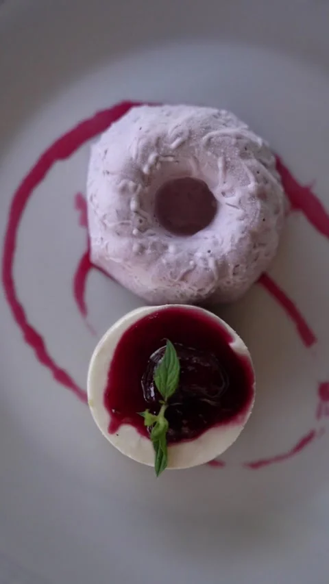 Top view of Raspberry Cheesecake with Ice Cream on Elegant Table Stock Footage 336272430