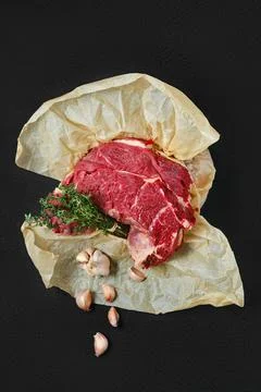Top view of raw beef neck wrap in paper Stock Photos