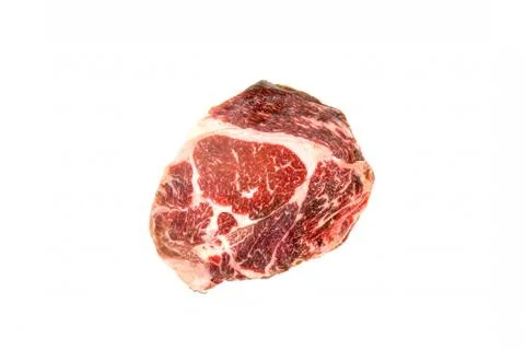 Top view of Raw beef rib eye steak on the  white background. Stock Photos