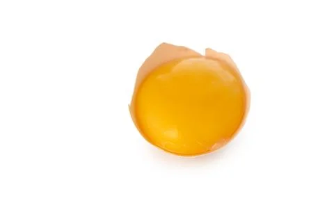 Top view of raw liquid egg yolk in open shell isolated on white 写真素材
