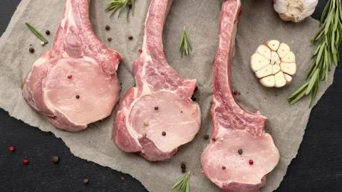 Top view raw meat on baking paper Photo Stock Photos