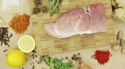 Top view raw pork chop steak on wooden background. Stock Footage 62598617
