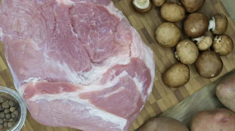 Top view raw pork chop steak on wooden background. Stock Footage 63545042