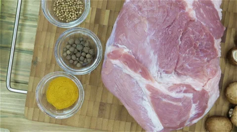 Top view raw pork chop steak on wooden background. Stock Footage 63545690