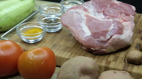 Top view raw pork chop steak on wooden background. Stock Footage 63545697