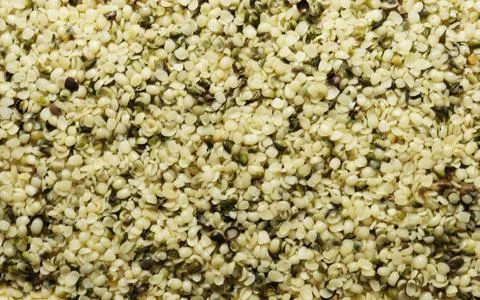 Top view of raw shelled hemp seed pattern Stock Photos