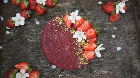 Top View of Raw vegan cake with strawberries Stock Footage 88691091