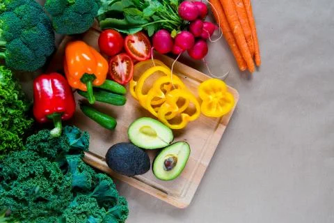 Top view of Raw vegetables on a cutting board. Healthy Ingredients for vegeta Stock Photos