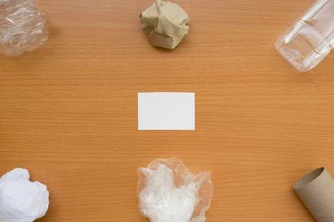 Top view of recycling garbage waste on wooden background with center copy spa Stock Photos