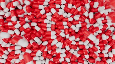 Top view of red and white pill capsules background Vídeos de archivo 330160815