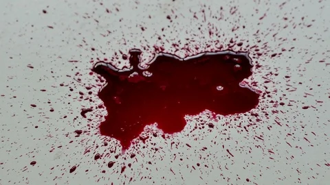 Top view red blood splash dropping on old gypsum plates. Video stock 115095767