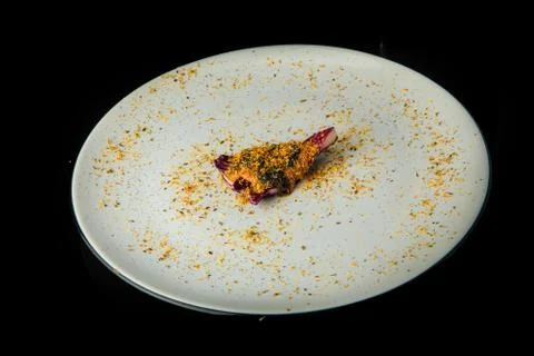 Top view on red cabbage slice finely decorated with assorted herbs Stock Photos