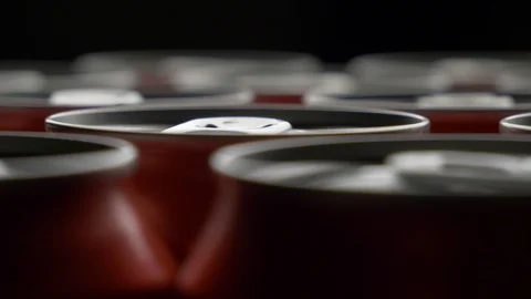 Top view of red can of soda or beer rotate background Stock Footage 106740307