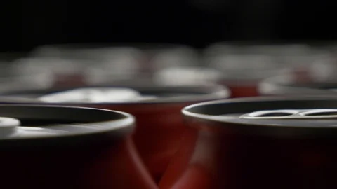Top view of red can of soda or beer rotate background Stock Footage 106740373