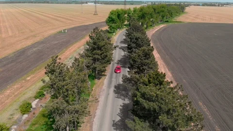 Top view of a red car moving on the road Stock Footage 121712929