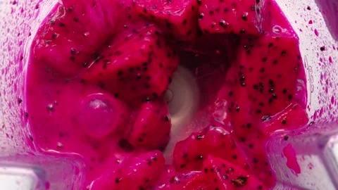 Top view of red dragon fruit mixing into blender seen from inside.The concept of Stock Footage 139184863