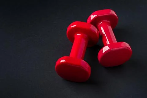 Top view red dumbbells with copy space for fitness advertising and design use 스톡 사진