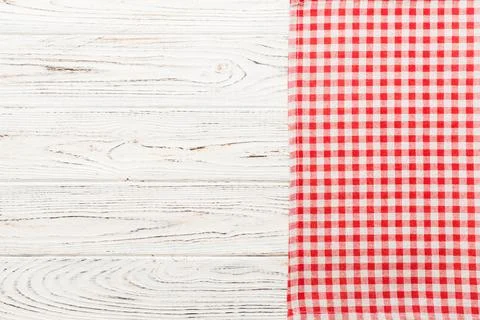 Top view with red empty kitchen napkin isolated on table background. Folded.. Stock Photos