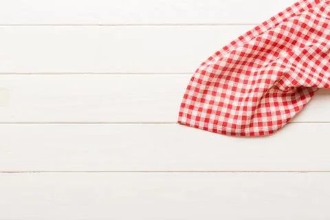 Top view with red empty kitchen napkin isolated on table background. Folded c Stock Photos