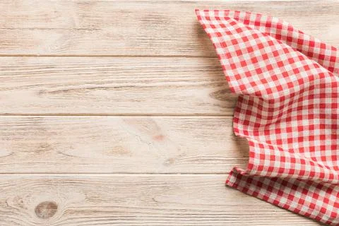 Top view with red empty kitchen napkin isolated on table background. Folded c Stock Photos