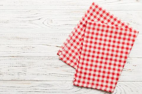Top view with red empty kitchen napkin isolated on table background. Folded c Stock Photos