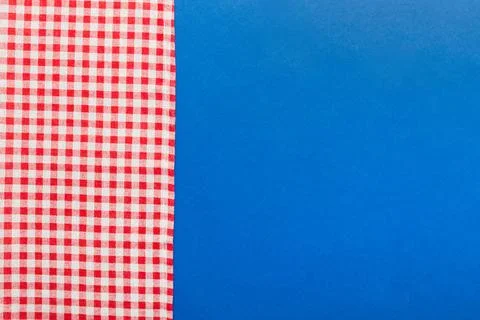 Top view with red empty kitchen napkin isolated on table background. Folded.. Stock Photos