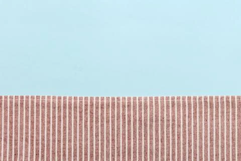 Top view with red empty kitchen napkin isolated on table background. Folded.. Stock Photos