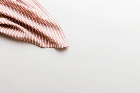 Top view with red empty kitchen napkin isolated on table background. Folded c Stock Photos