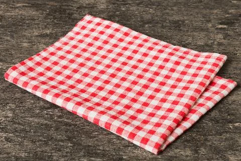 Top view with red empty kitchen napkin isolated on table background. Folded c Stock Photos